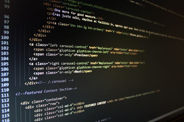 HTML code displayed on a computer monitor, representing infrastructure management